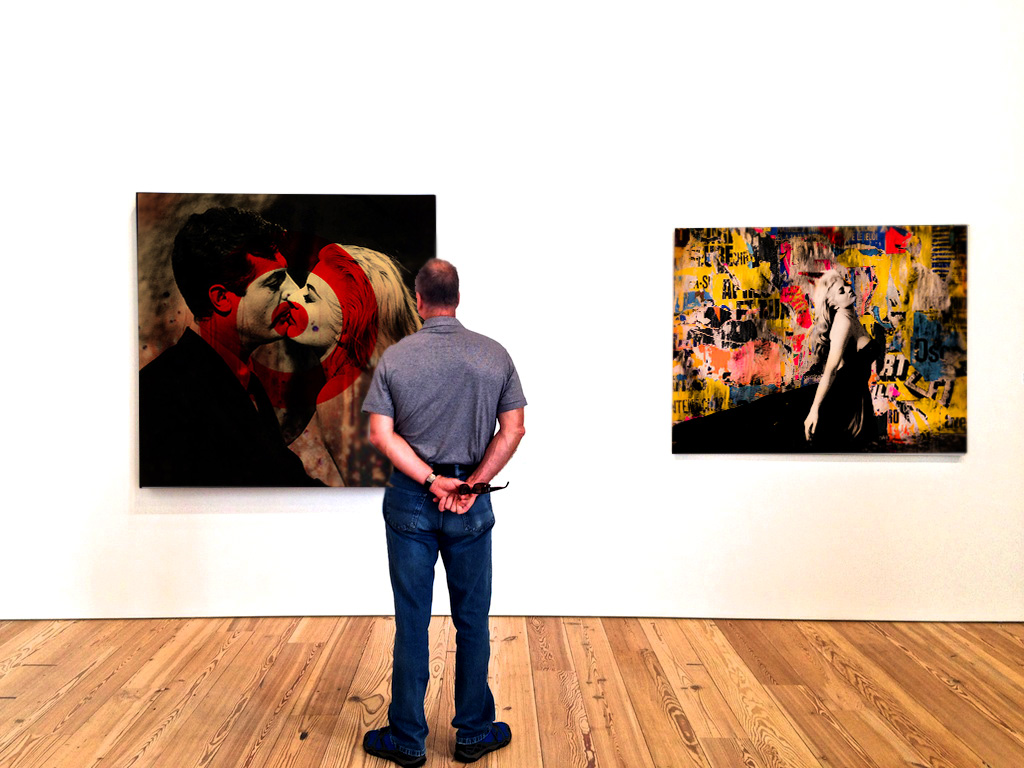 looking at two artworks on the art exhibit La Dolce Vita Milano 2019